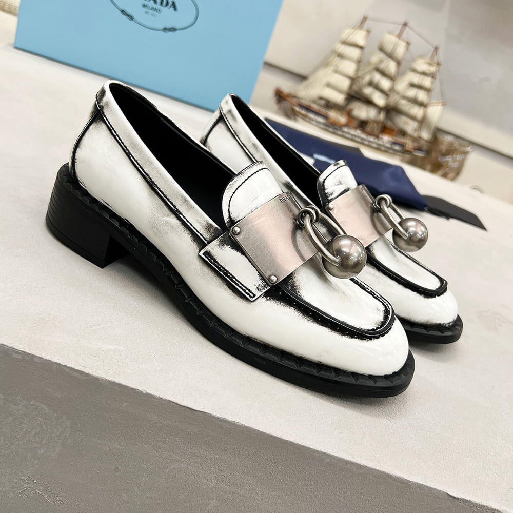 Pra*a Brushed leather loafers with metal details