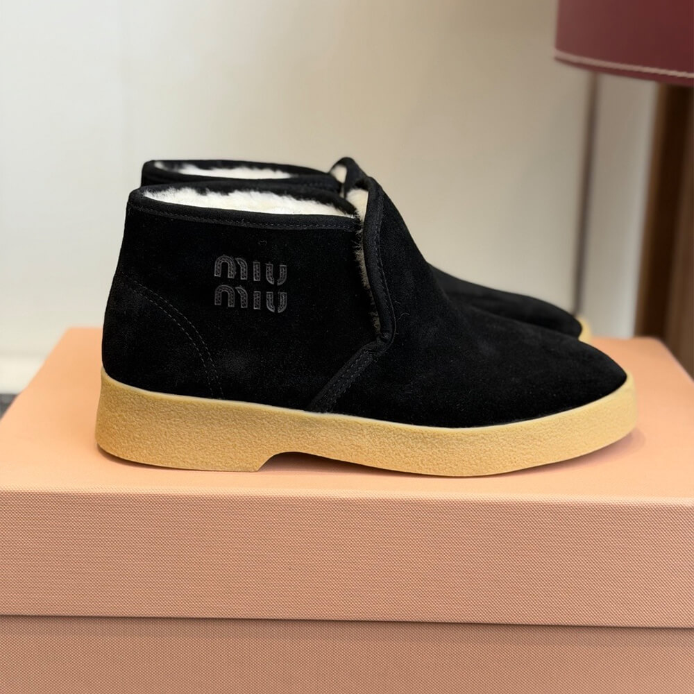 M1um1u Suede and shearling slip-on booties