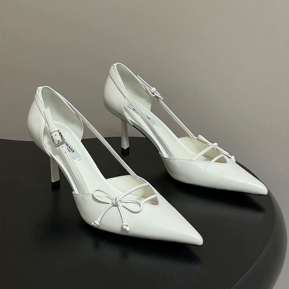 Pra*a Open-side leather pumps